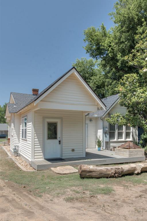 1134 NW 40th St, Oklahoma City, OK 73118 - bungalow-style home with roof with shingles and a chimney
