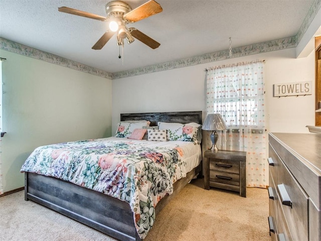 3900 Chetwood Dr, Del City, OK 73115 - carpeted bedroom featuring a textured ceiling and a ceiling fan