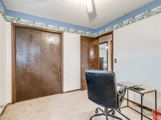 3900 Chetwood Dr, Del City, OK 73115 - carpeted home office with a textured ceiling and baseboards