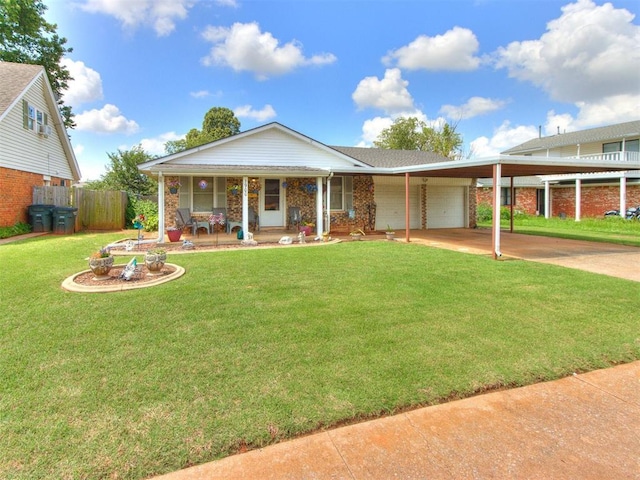 3900 Chetwood Dr, Del City, OK 73115 - view of front of house with a porch, driveway, an attached garage, a carport, and brick siding
