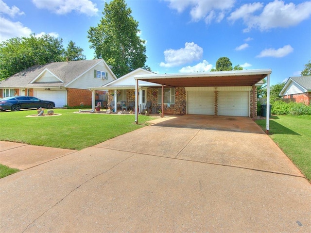 3900 Chetwood Dr, Del City, OK 73115 - view of front of house featuring a front yard, driveway, an attached garage, and brick siding