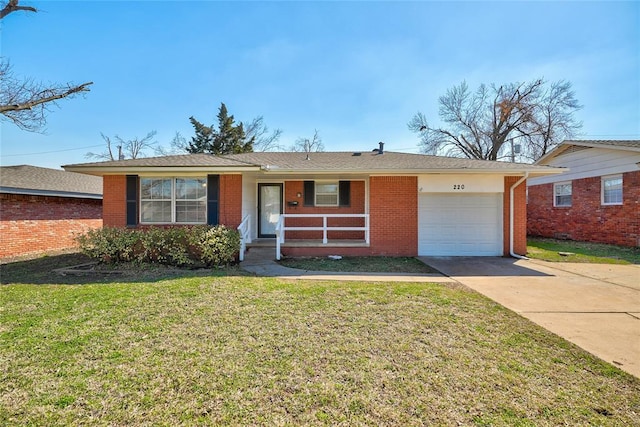 220 E 31st St, Edmond, OK 73013 - single story home with a garage, driveway, brick siding, a front yard, and covered porch