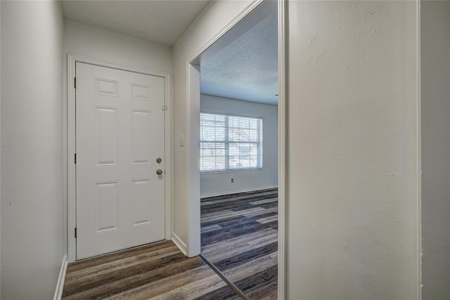 220 E 31st St, Edmond, OK 73013 - entrance foyer with dark wood-style floors and baseboards
