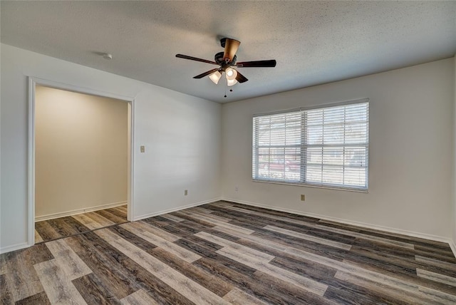 220 E 31st St, Edmond, OK 73013 - unfurnished room with wood finished floors, a ceiling fan, and a textured ceiling