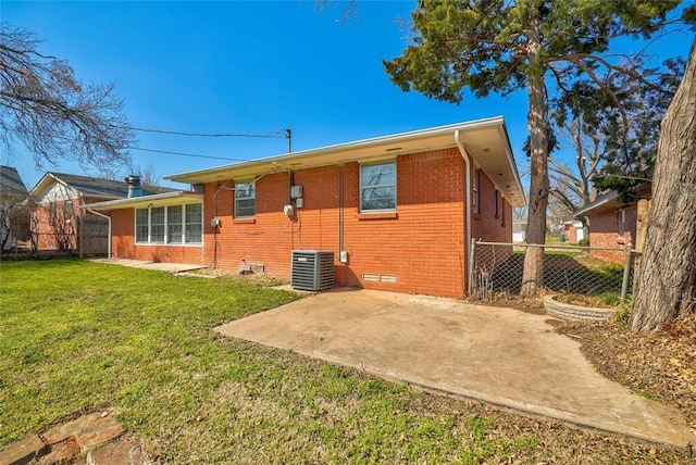 220 E 31st St, Edmond, OK 73013 - rear view of property with a patio area and brick siding