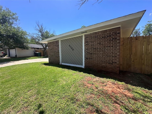 6708 Lyrewood Cir, Oklahoma City, OK 73132 - view of home's exterior with brick siding