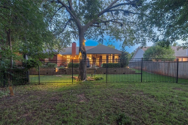 2801 Brixton Rd, Edmond, OK 73034 - view of yard at dusk