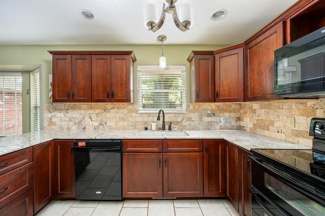 2504 NW 119th St, Oklahoma City, OK 73120 - kitchen with black appliances, light stone countertops, decorative backsplash, light tile patterned flooring, and recessed lighting