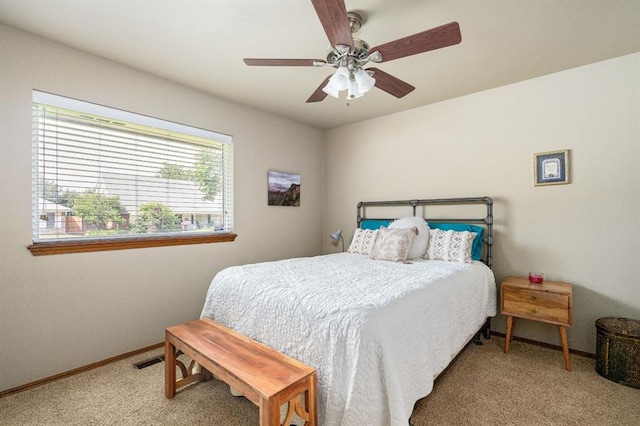 2504 NW 119th St, Oklahoma City, OK 73120 - bedroom with carpet flooring and a ceiling fan