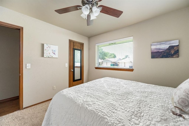 2504 NW 119th St, Oklahoma City, OK 73120 - carpeted bedroom featuring baseboards and a ceiling fan