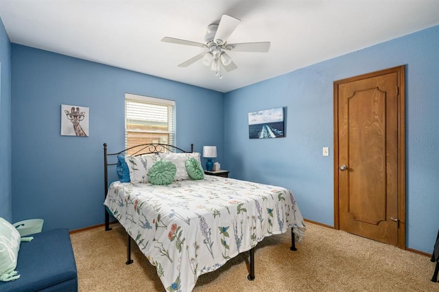 2504 NW 119th St, Oklahoma City, OK 73120 - carpeted bedroom featuring ceiling fan and baseboards