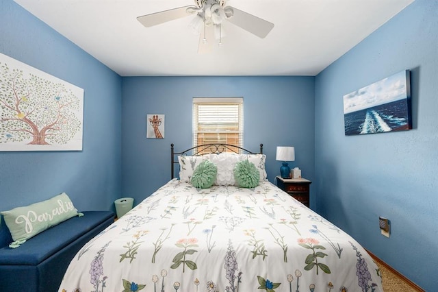 2504 NW 119th St, Oklahoma City, OK 73120 - carpeted bedroom with a ceiling fan