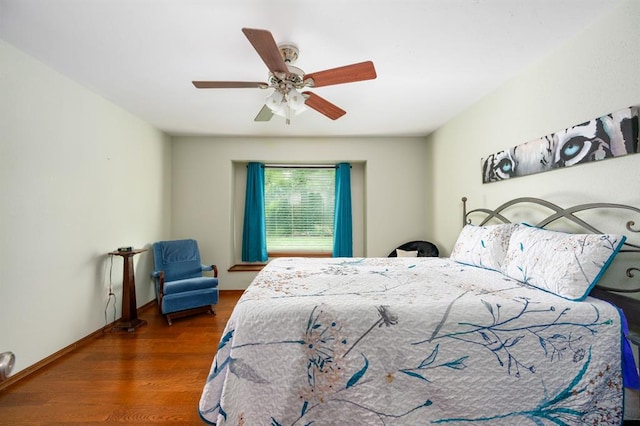2504 NW 119th St, Oklahoma City, OK 73120 - bedroom featuring wood finished floors and a ceiling fan