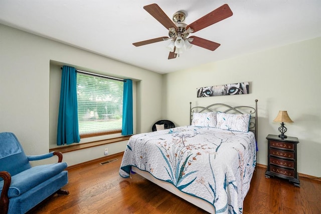 2504 NW 119th St, Oklahoma City, OK 73120 - bedroom featuring wood finished floors and a ceiling fan