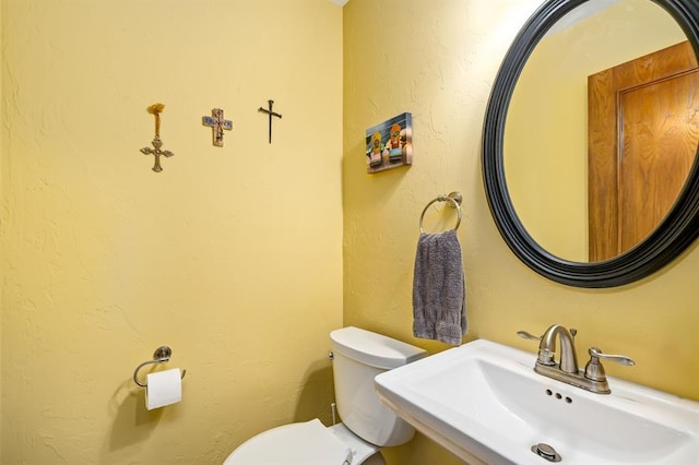 2504 NW 119th St, Oklahoma City, OK 73120 - bathroom with a sink and toilet