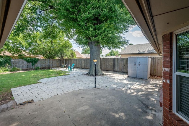 2504 NW 119th St, Oklahoma City, OK 73120 - fenced backyard with a patio area