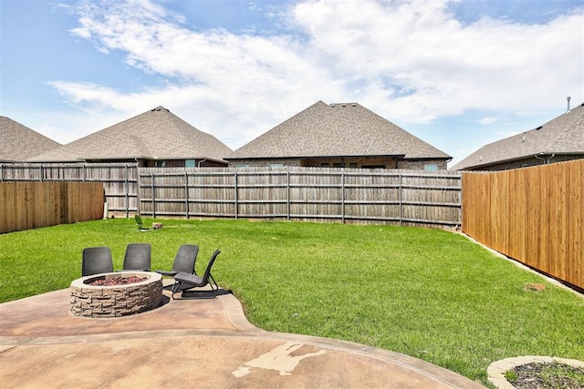 2937 Thompson Farm Ln, Yukon, OK 73099 - fenced backyard featuring a patio and an outdoor fire pit
