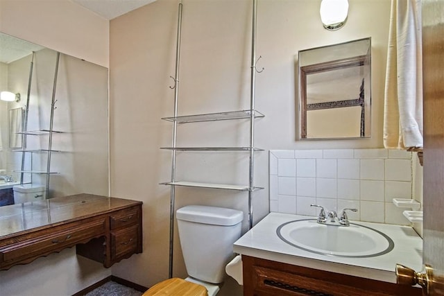 3913 SE 14th Pl, Oklahoma City, OK 73115 - bathroom featuring vanity and decorative backsplash