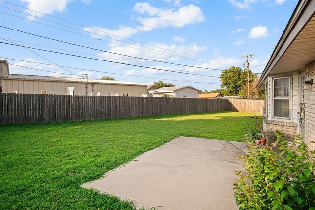 3913 SE 14th Pl, Oklahoma City, OK 73115 - fenced backyard featuring a patio