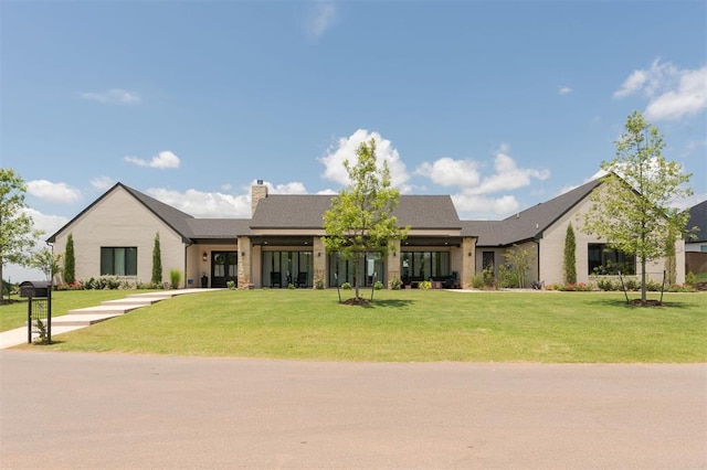 501 Old Creek Rd, Edmond, OK 73034 - view of front of house featuring a chimney and a front yard