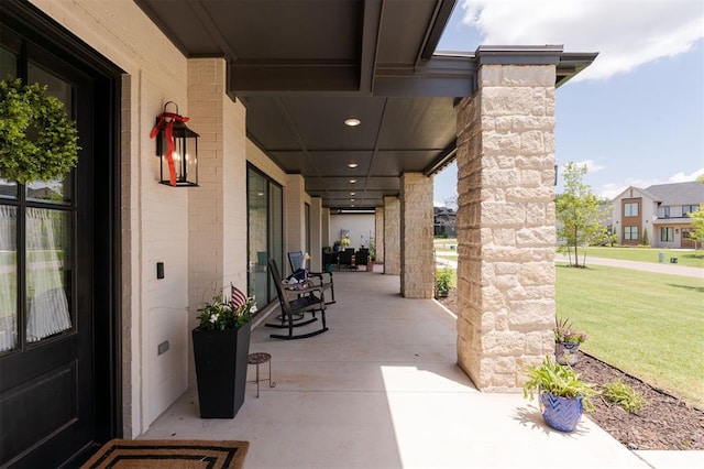 501 Old Creek Rd, Edmond, OK 73034 - covered porch featuring a yard