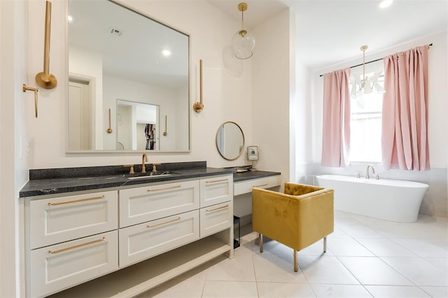 501 Old Creek Rd, Edmond, OK 73034 - full bath with a freestanding bath, vanity, and tile patterned flooring