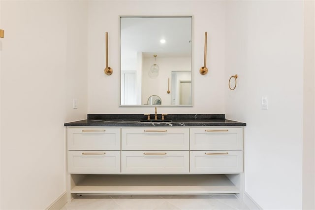 501 Old Creek Rd, Edmond, OK 73034 - bathroom featuring vanity and baseboards