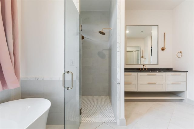 501 Old Creek Rd, Edmond, OK 73034 - full bath featuring vanity, a stall shower, a soaking tub, and tile patterned flooring