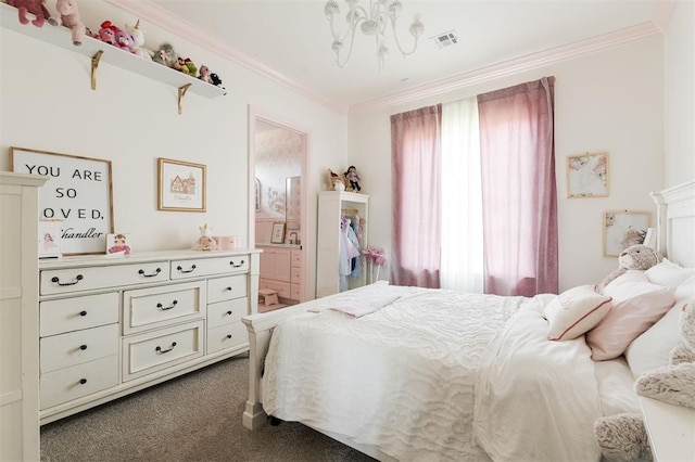 501 Old Creek Rd, Edmond, OK 73034 - bedroom with dark carpet and crown molding