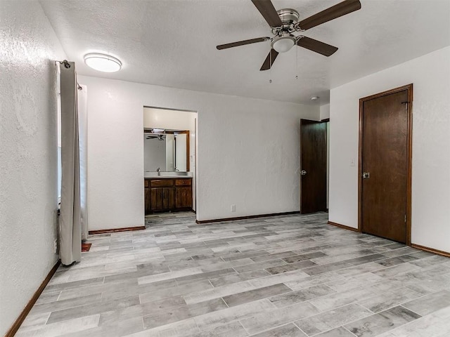 2912 Smiling Hill Blvd, Edmond, OK 73013 - unfurnished bedroom with ensuite bath and ceiling fan