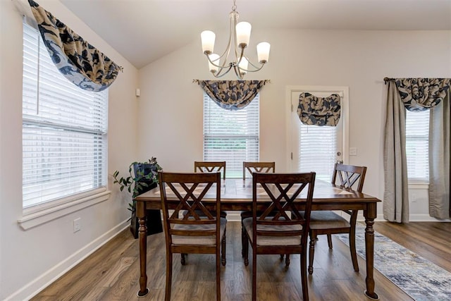 2161 Native Dancer Dr, Choctaw, OK 73020 - dining space featuring a chandelier, dark wood finished floors, and lofted ceiling