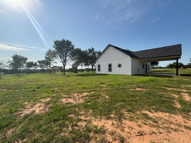 379100 E 1100th Rd, Okemah, OK 74859 - view of grassy yard with a carport