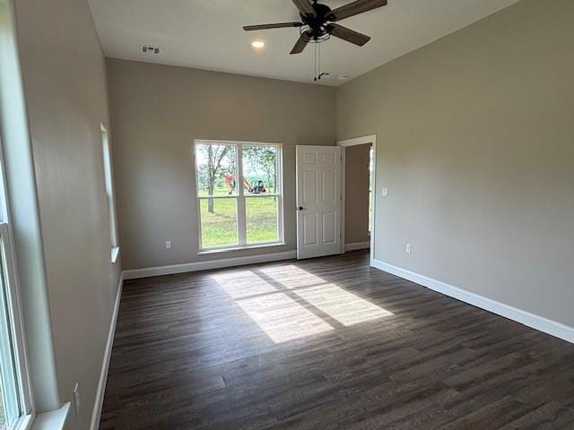 379100 E 1100th Rd, Okemah, OK 74859 - spare room with ceiling fan, dark wood-style floors, and recessed lighting