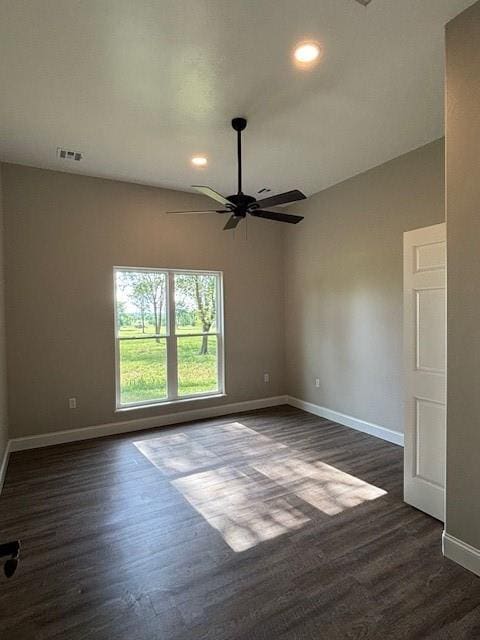 379100 E 1100th Rd, Okemah, OK 74859 - unfurnished room with a ceiling fan, dark wood-style flooring, and recessed lighting