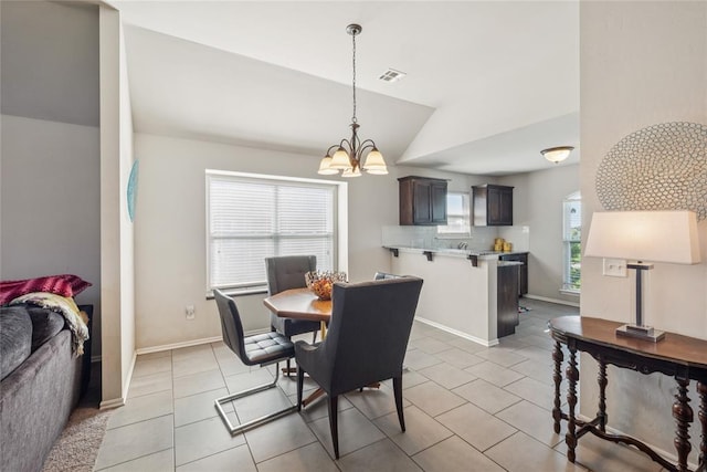 4116 NW 154th St, Edmond, OK 73013 - dining room featuring a chandelier, lofted ceiling, and light tile patterned flooring