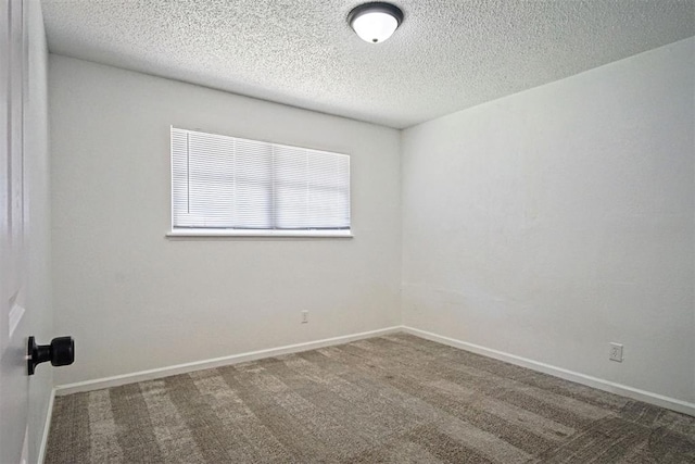 6220 S Douglas Ave, Oklahoma City, OK 73139 - unfurnished room with carpet and a textured ceiling