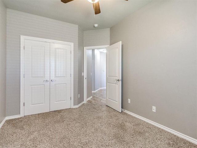 7313 Jack Dr, Oklahoma City, OK 73132 - unfurnished bedroom featuring light carpet, a closet, and ceiling fan