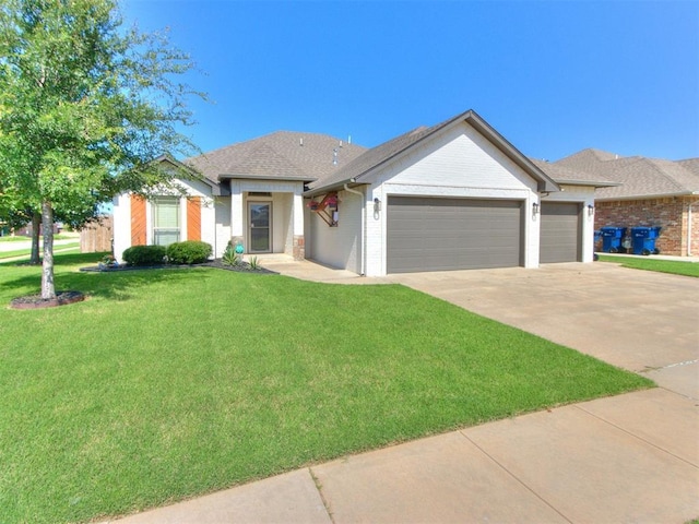 7313 Jack Dr, Oklahoma City, OK 73132 - single story home featuring an attached garage, a front yard, driveway, and brick siding