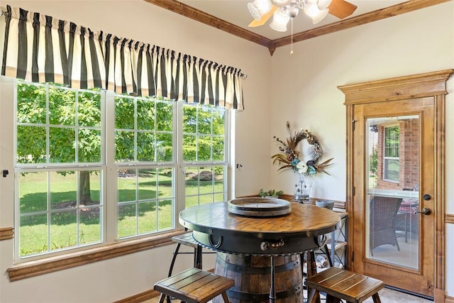 227 Quail Hollow Way, Choctaw, OK 73020 - dining room featuring ornamental molding, a ceiling fan, and healthy amount of natural light