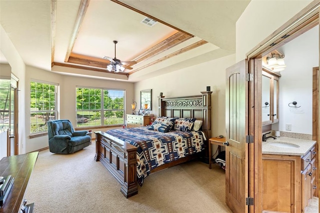 227 Quail Hollow Way, Choctaw, OK 73020 - bedroom featuring a tray ceiling, light colored carpet, and ceiling fan