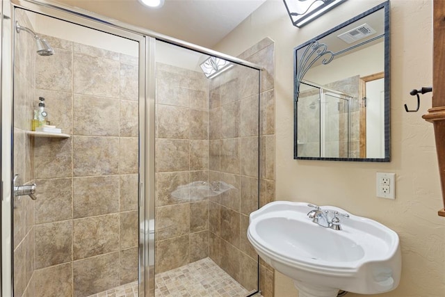 227 Quail Hollow Way, Choctaw, OK 73020 - full bath featuring a sink and a shower stall