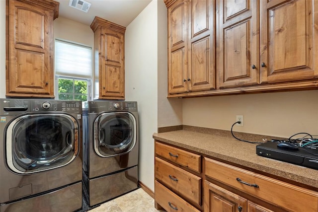 227 Quail Hollow Way, Choctaw, OK 73020 - laundry area with washing machine and dryer and cabinet space