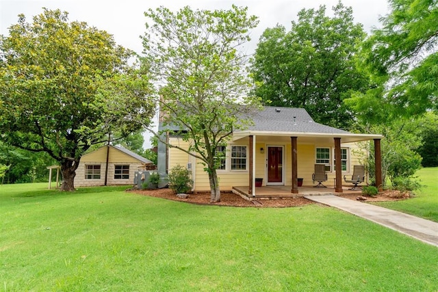80 E Shore Dr, Arcadia, OK 73007 - view of front facade featuring a front yard and covered porch