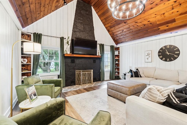 80 E Shore Dr, Arcadia, OK 73007 - living area featuring wooden ceiling, plenty of natural light, wood finished floors, a fireplace, and high vaulted ceiling