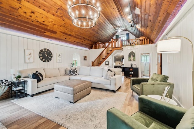 80 E Shore Dr, Arcadia, OK 73007 - living room with stairway, wood finished floors, wood ceiling, a chandelier, and high vaulted ceiling