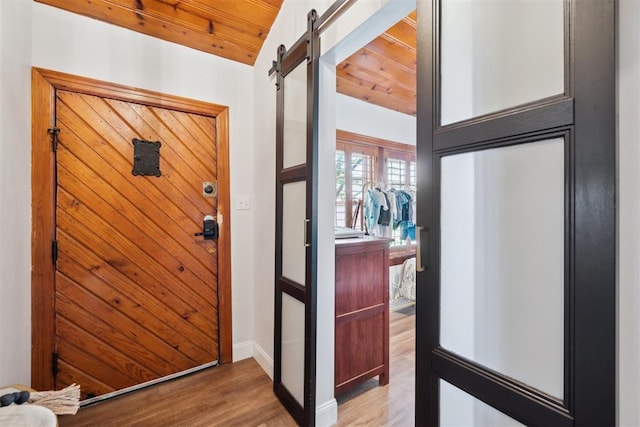 80 E Shore Dr, Arcadia, OK 73007 - foyer entrance featuring light wood-style flooring and a barn door