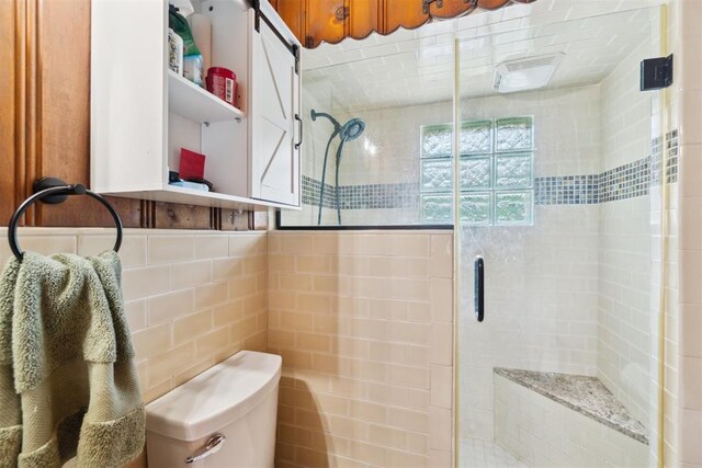 80 E Shore Dr, Arcadia, OK 73007 - bathroom featuring tile walls and a shower stall