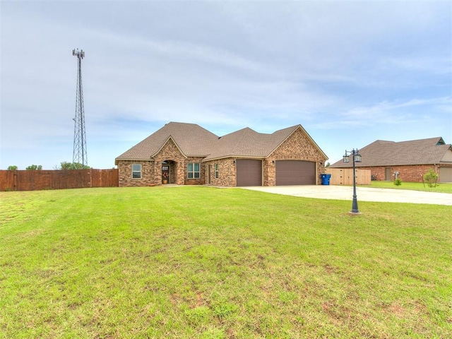 2395 County Road 1260, Blanchard, OK 73010 - view of front facade with concrete driveway, an attached garage, and stone siding