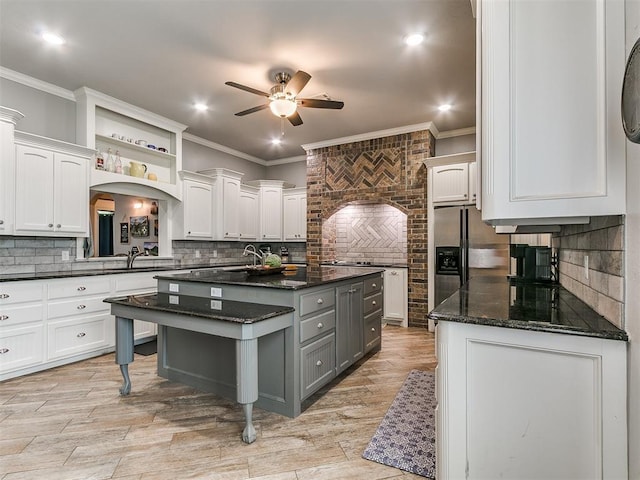 2395 County Road 1260, Blanchard, OK 73010 - kitchen with a ceiling fan, tasteful backsplash, crown molding, gray cabinets, and white cabinets