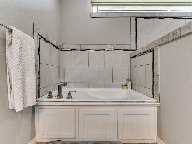 2395 County Road 1260, Blanchard, OK 73010 - bathroom with a garden tub and baseboards